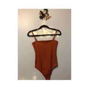 Misguided orange ribbed bodysuit